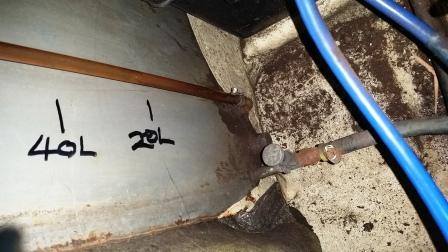 Markings on the tank exterior.